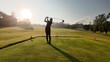 © sittinan - Woman playing golf on beautiful course , swinging and hitting golf ball , luxury vacation