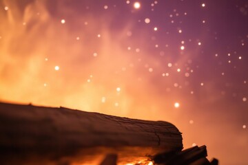 Poster - A fire is lit in the night sky, with sparks and flames visible against the dark background