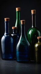 Poster - Various glass bottles with cork stoppers in different colors and shapes against dark background
