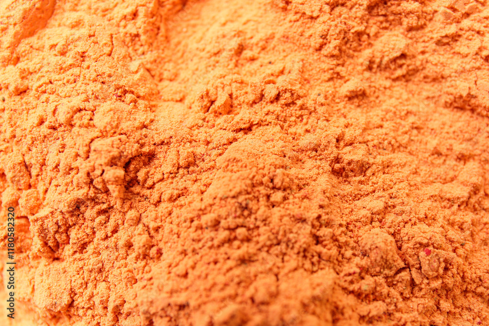 Texture of bright powder pigment as background, closeup