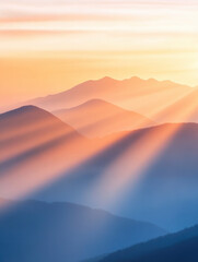 Poster - Breathtaking mountain landscape at sunrise with soft light rays illuminating peaks and valleys, creating serene atmosphere