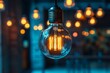 © tzu - Vintage Light Bulb with Warm Bokeh Background for Creative Inspiration