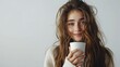 © MyDorkyDolphin - A young woman with long hair and a warm smile holding a coffee cup, creating an inviting and cozy aesthetic, on a pure white background. 8k UHD, suitable for high-quality printing or digital