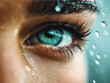 © JFM - Close-Up of Eye with Raindrops on Glass