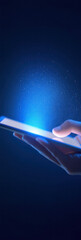 Aufkleber - hand holding smartphone emits glowing blue light in darkness, creating magical atmosphere