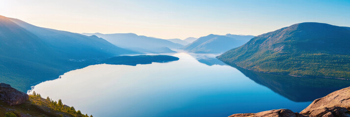 Poster - Breathtaking landscape featuring serene lake surrounded by mountains, reflecting clear blue sky