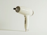 Elegant White Hair Dryer on Minimalist Background with Soft Lighting