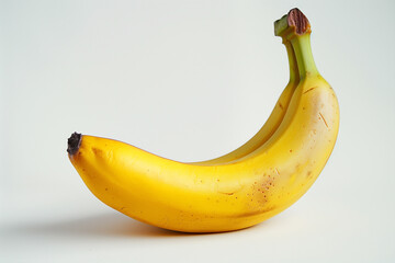 Wall Mural - Two ripe bananas with a smooth yellow peel, displayed on a white background.