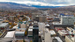 © AmazingAerialAgency - Aerial view of downtown Reno with city hall and high-rise buildings surrounded by mountains, Reno, United States.