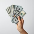 © GFX - hand with dollars isolated on white background