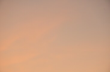 Wall Mural - blurry orange sky at sunset in evening back ground and texture