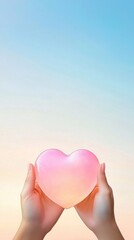 Wall Mural - A pair of hands holding a glowing heart against a soft gradient background.