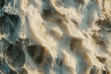 Wall Mural - aerial view of turbulent ocean waves crashing against each other, creating white foam and swirling p