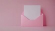 © Nathan - A charming pink envelope with a blank white letter peeking out, set against a soft pink background.