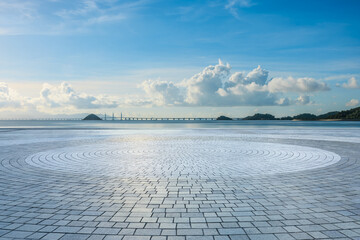 Wall Mural - empty square floor and beautiful coastline natural scenery. parking lot by the sea.