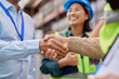 © Rido - Close up of construction workers handshake