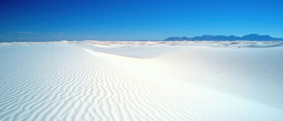 Aufkleber - Vast rolling sand dunes with intricate patterns under a clear blue sky