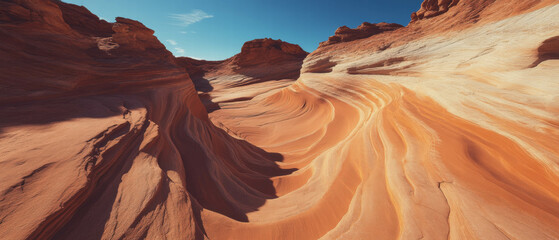 Poster - Natural sandstone arches create stunning patterns in desert landscape under blue sky