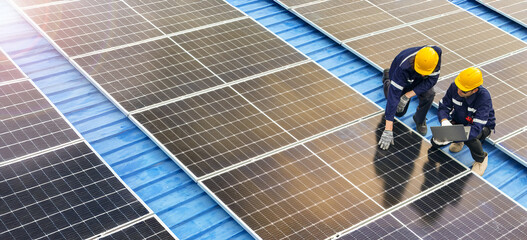 professional inspecting solar panel installations on a rooftop ensuring renewable energy efficiency 