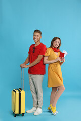 Sticker - Happy travellers with suitcase on light blue background