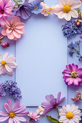 Wall Mural - Frame with colorful flowers on clear pastel purple background. Greeting card design for holiday, Mother's day, Easter, Valentine day. Springtime composition with copy space. Flat lay, top view