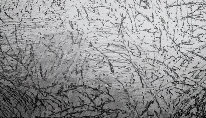 Poster - abstract black tree branch patterns on textured silver fabric background for artistic, textile, or design inspiration