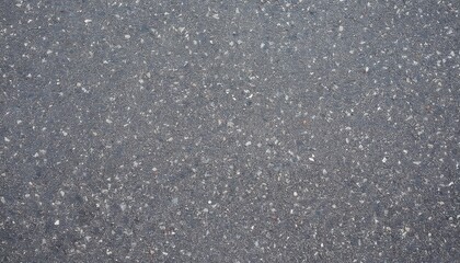 Poster - high-resolution close-up of asphalt texture with small gravel and fine cracks, ideal for backgrounds, urban design, or road surface studies

