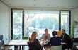 © Geber86 - Business team brainstorming in modern office with natural light