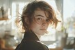 © wernerimages - This image showcases a close-up portrait of a young person with tousled hair, emphasizing a natural and candid expression that evokes a sense of youth and spontaneity.
