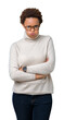 © Krakenimages.com - Young beautiful african american woman wearing glasses over isolated background skeptic and nervous, disapproving expression on face with crossed arms. Negative person.