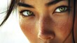 © Atmospheric stock - Close-up of asian female with freckles and green eyes capturing intensity and beauty
