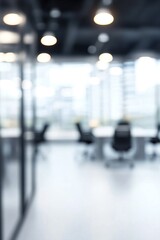 Blurred modern office interior with bright lights and glass walls. Corporate workspace concept. Clean, minimalist design for business environment with copy space