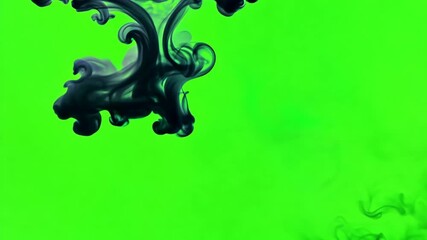 Wall Mural - dark smoke on a green screen background - chroma key effect