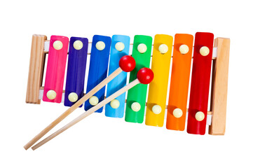 Children multi-colored xylophone with sticks. Isolated over white background