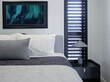 © Rowena Naylor/Stocksy - Modern bedroom design featuring creative wall art and stylish decor
