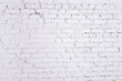 © Rachel Schmidt/Stocksy - Painted bright white brick wall texture background