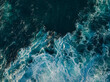 © C6 Studio/Stocksy - Top down aerial view of ocean wave crashing on coastline at sunset