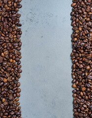 Roasted coffee beans frame a gray background.  Perfect for your coffee shop menu.