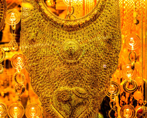 Wall Mural - Colorful golden jewelry ornaments, Grand Bazaar, Istanbul, Turkey. Grand Bazaar is the heart of the gold and foreign exchange in Turkey. Good place to buy gold.