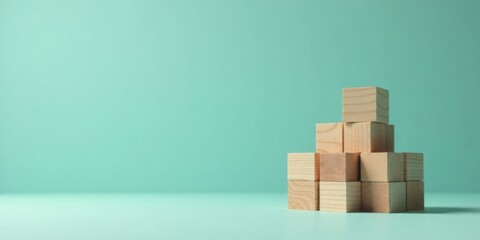 Poster - Unconstructed Wooden Cubes on a Light Green Background