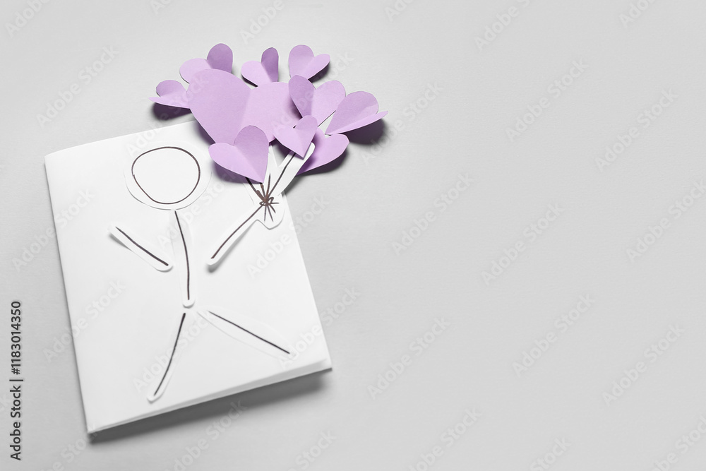 Creative greeting card on grey background. Valentine's Day celebration