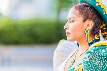 Hispanic woman wearing traditional clothes participating in parade celebrating Dia de la hispanidad