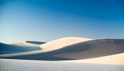 Wall Mural - Serene white sand dunes under a vibrant blue sky. A minimalist landscape.