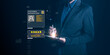 © Kornkanok - A businessman professional individual using a digital tablet to access customer data and ratings, with futuristic interface elements in a dark environment.