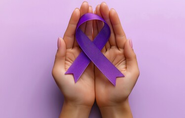 a hand clutching a ribbon on a light purple background represents cancer awareness. world cancer day