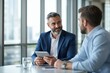 © PlanetOfVectors - Two business professionals engaging in a discussion while seated in a modern office space with large windows, holding a tablet, concept of teamwork. Ai generative.