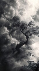 Wall Mural - Dramatic Monochrome Landscape: Tree in Stormy Clouds