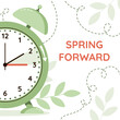 © Ekaterina Salova - Spring Forward, Summer Time, Daylight saving time. Clock set to an hour ahead. Web banner of alarm clock with green foliage with call to switch to dst.