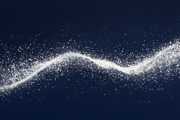 Wall Mural - White snow particles falling on a dark blue background