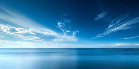 Poster - A serene image capturing the beauty of the blue sky and the sea, showcasing a vibrant blue sky that complements the tranquil sea, inviting viewers to appreciate this peaceful natural scene.